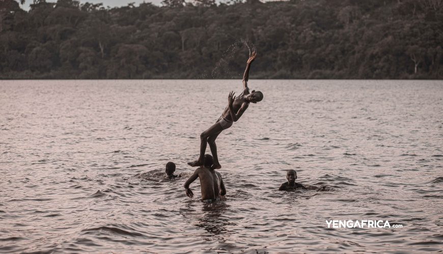 Kids playing after school in Lake Ossa, Dizangue.