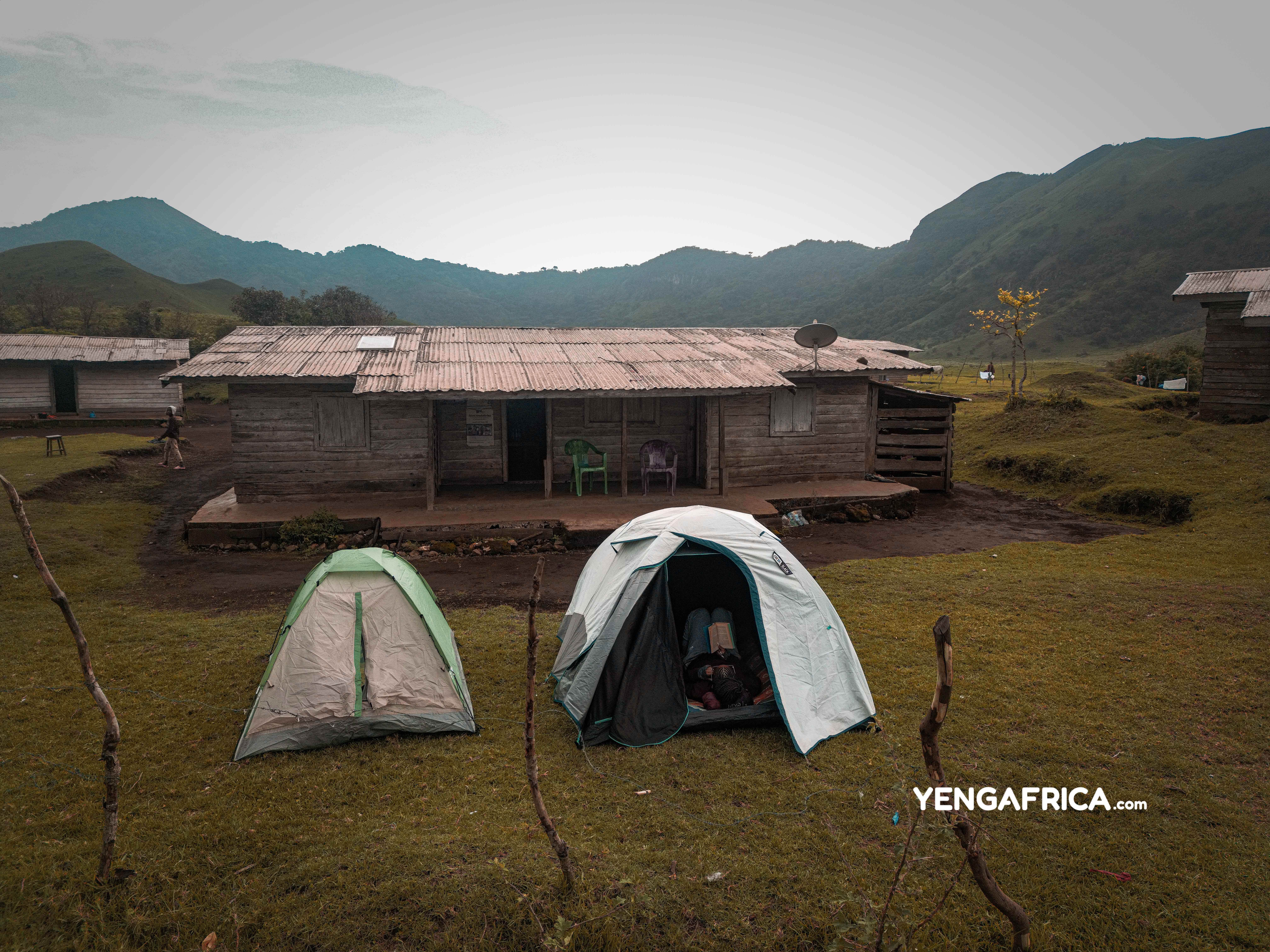 Solo female traveler camping next to a bororo camp at the manengouba twin lakes - YENGAFRICA