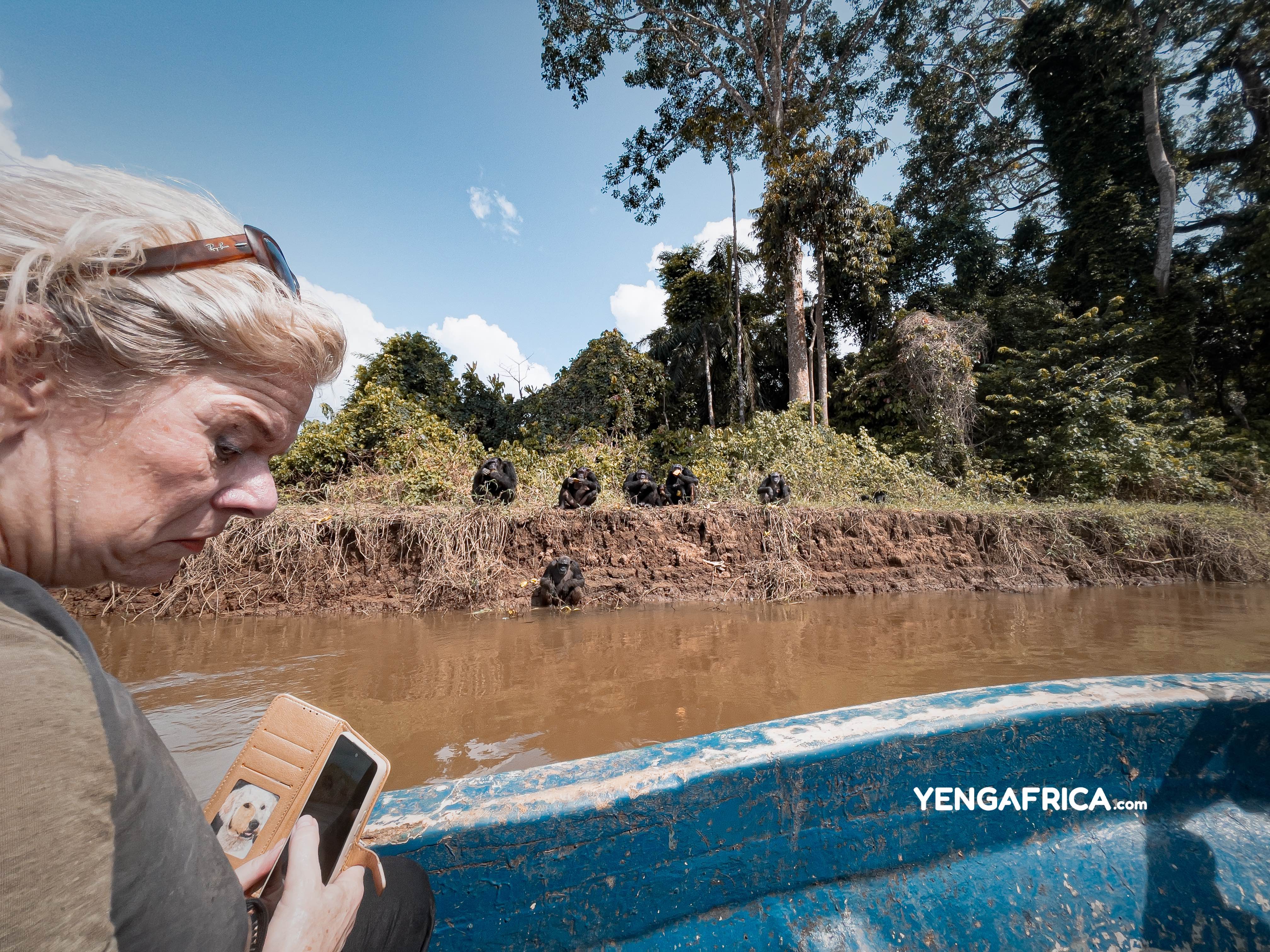 Solo female traveller on a day trip at at the pongo songo chimpanzee island in the Douala Edea park at Mouanko - YENGAFRICA
