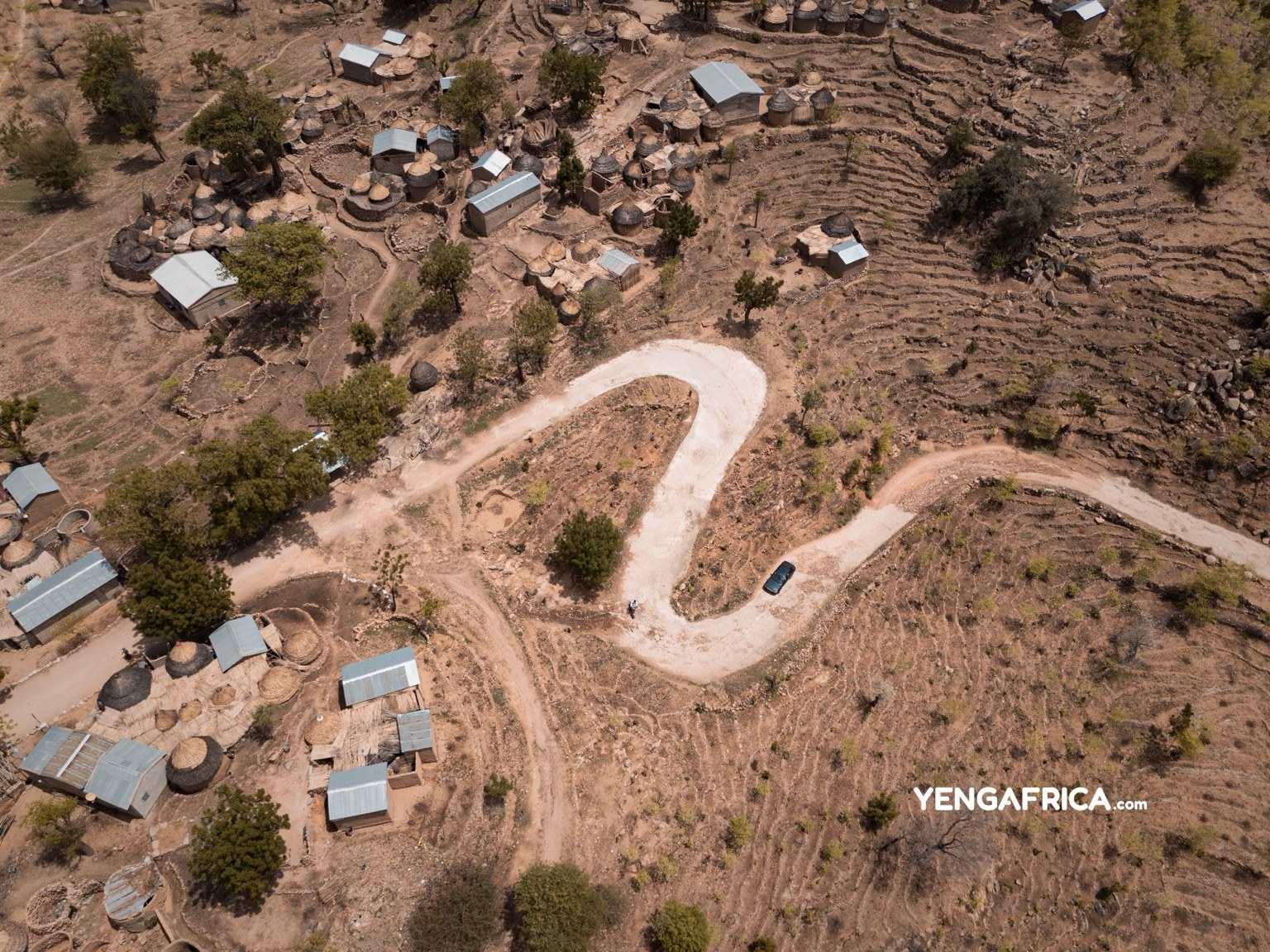 Car driving up to Oudjila village