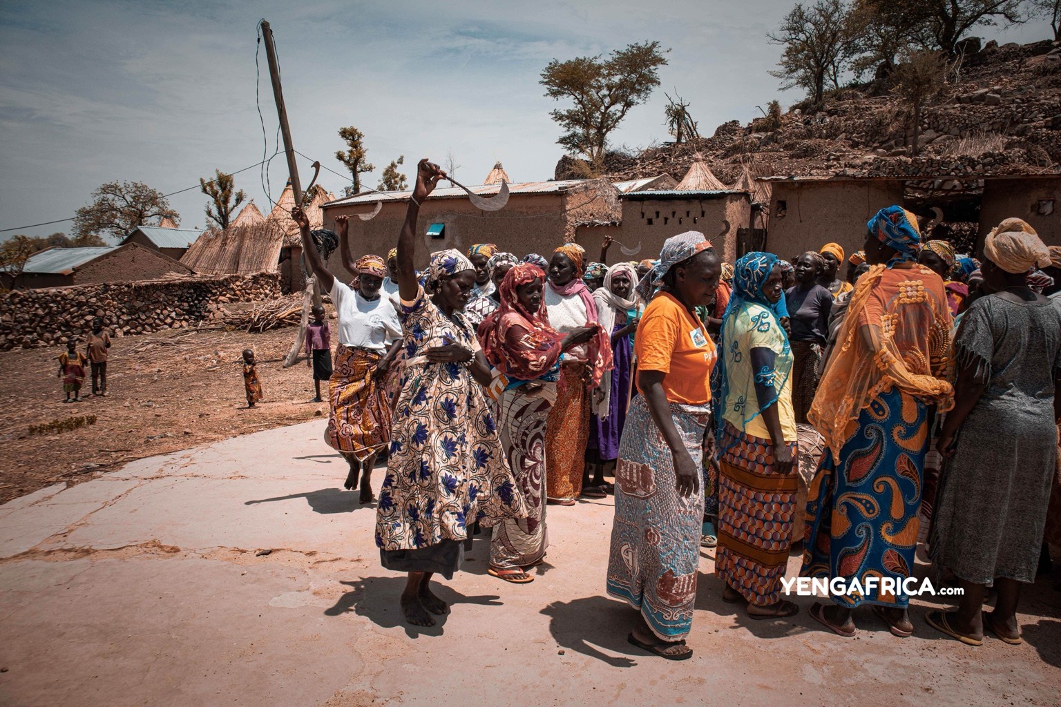 Oudjila women demonstrating the warrior danse in the courtyard.