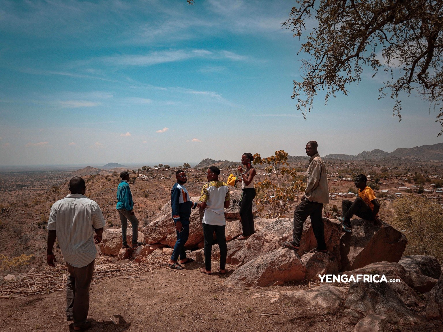 Tourists at the terrace viewing the city of Mora and the memorial tombs of the Oudjila ancestors.
