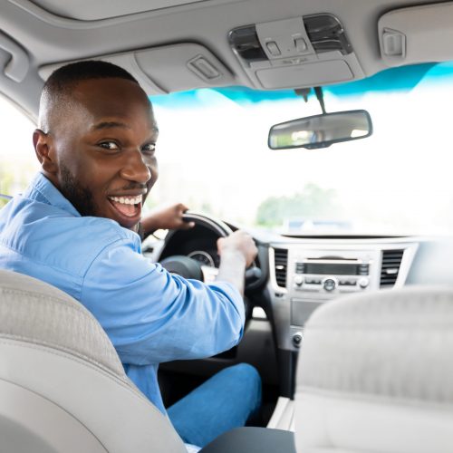 Happy,Driver.,Portrait,Of,Cheerful,Positive,African,American,Man,Looking